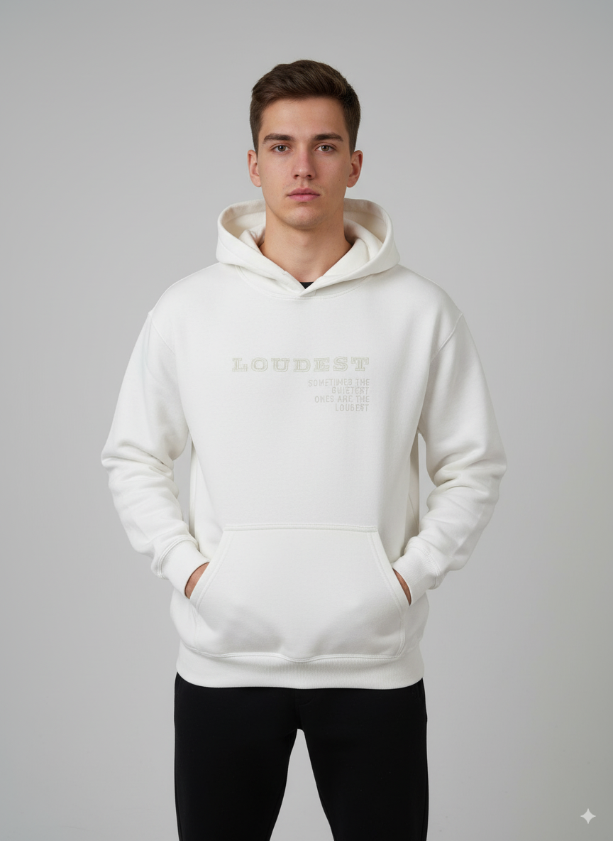 Man wearing a white hoodie with text on a gray background